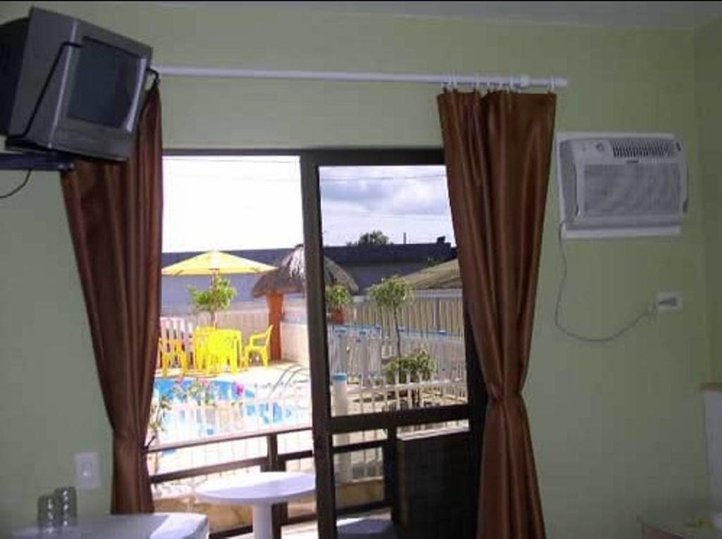 Hotel Pousada Mineirinho Balneário Praia do Leste Habitación foto